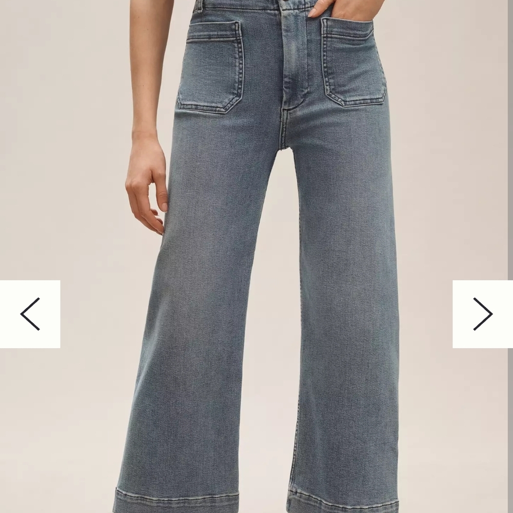 Light Wash Pilcro Flare Wide Leg Jeans with High Waist Design